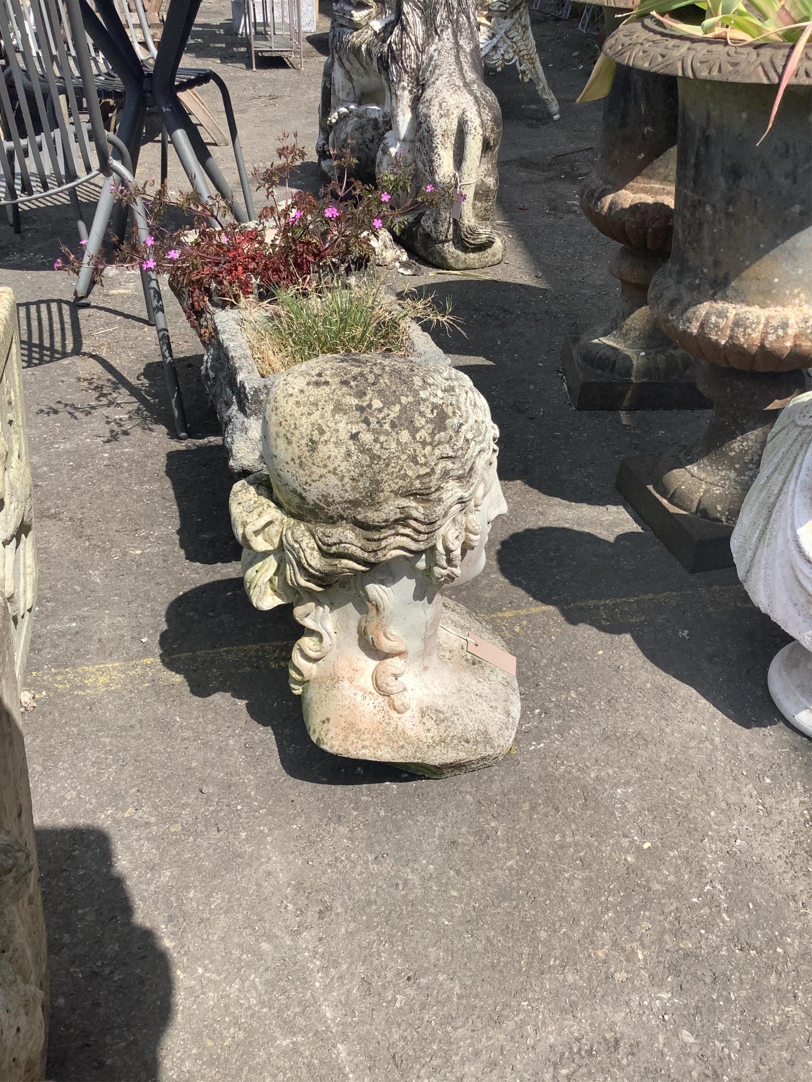 A reconstituted stone classical female bust garden ornament, height 50cm